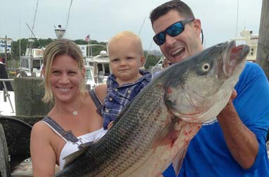 One of the guys reeling in a 41 lb bass