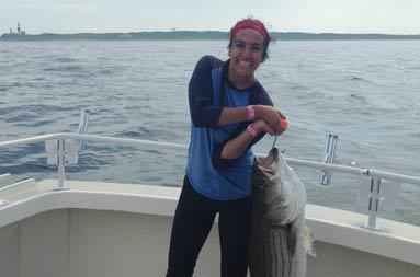 One of the young women trying to lift her very large bass