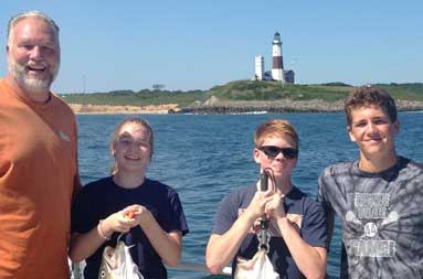 Photo of the 4 guests with their catch