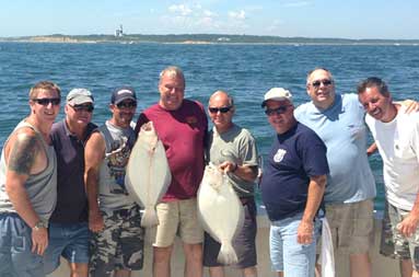 Large group photo with their catch