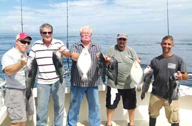 Group photo of everyone with their catch