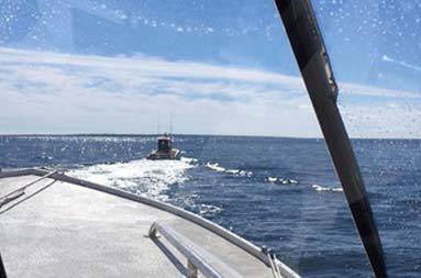 View from the inside of the boat looking out at the tug but pulling them back to shore