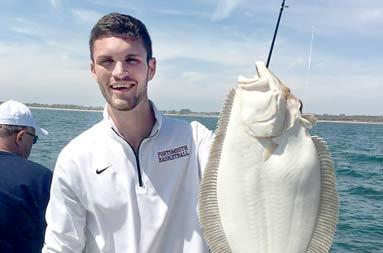 A second guy holding up a fluke that was later released.