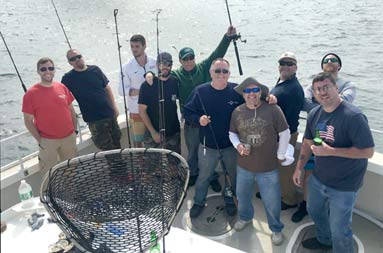 Overhead shot of the entire group of guys aboard the November Rain
