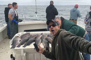A man jokingly takes a selfie.