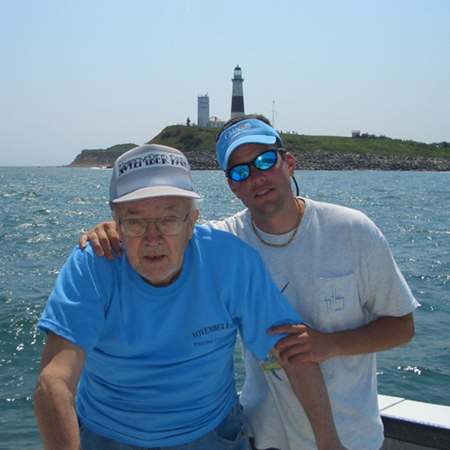 Steve and his grandfather, Bob, with the Montauk lighthouse behind them.